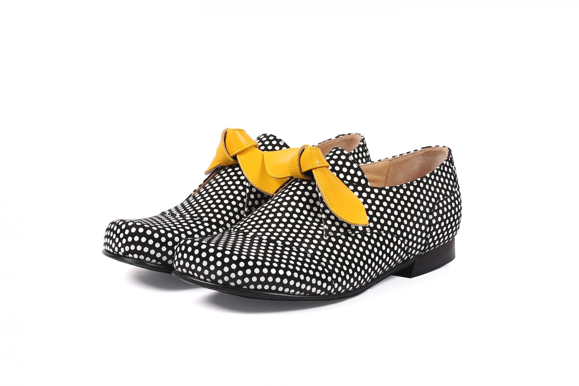 yellow and white polka dot shoes